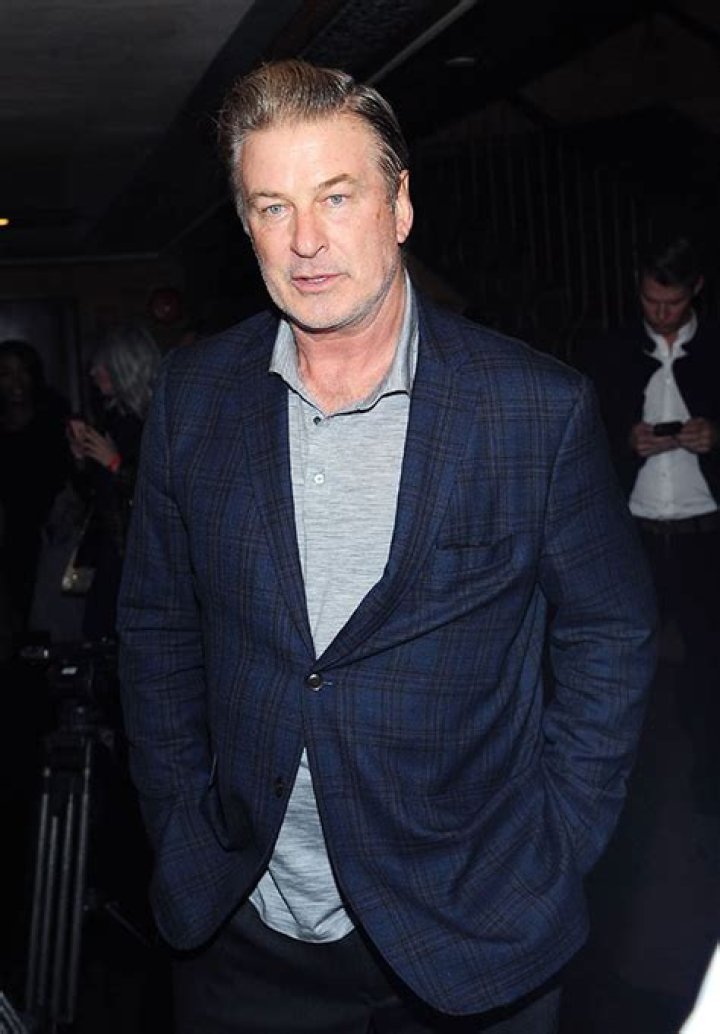 Alec Baldwin Tries To Avoid Paparazzi In 1st Photos Since Being Charged With Involuntary Manslaughter